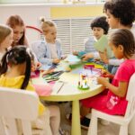Children engaged in creative activities during an art class at a preschool, fostering learning and fun.